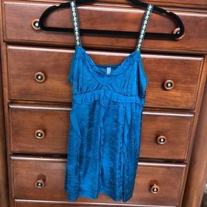Free people. Camisole top with embroidered straps. Size small